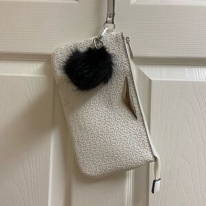 Guess White Wristlet with Black Pom Pom